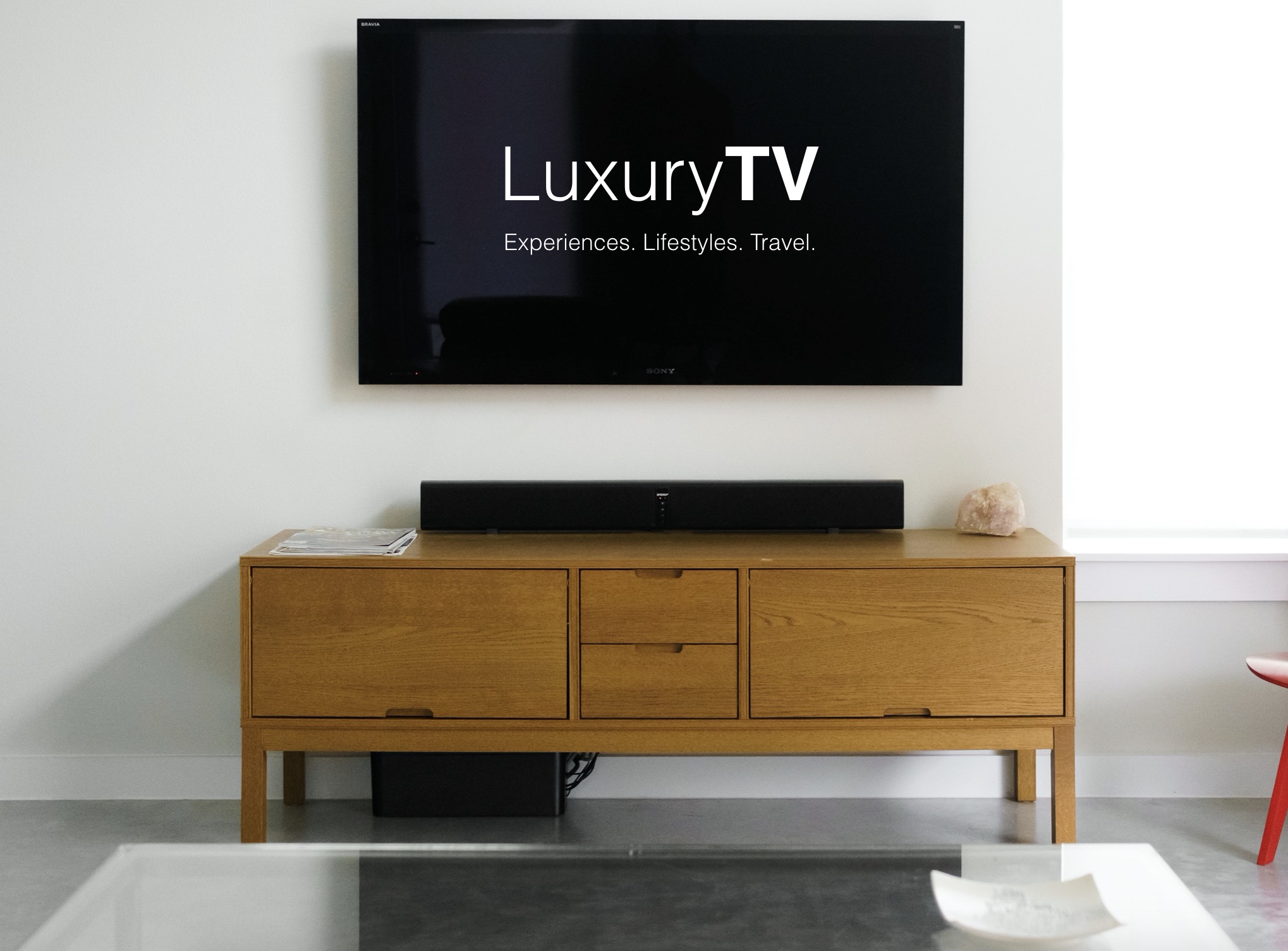 LuxuryTV logo and photo