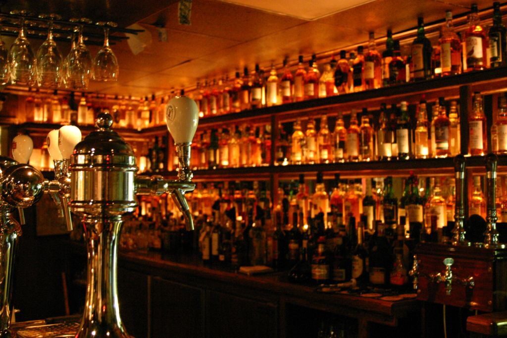 Dam Pub bar with whisky bottles
