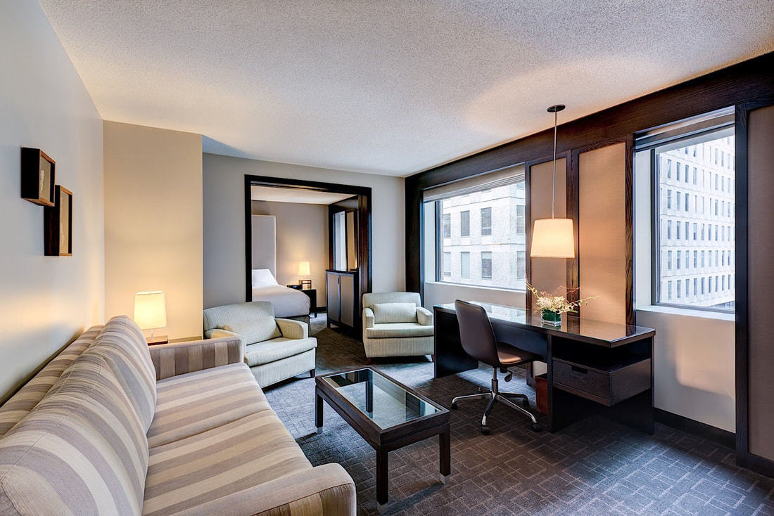 ARC THE HOTEL Ottawa - stylish-executive-suite with bed and sofa