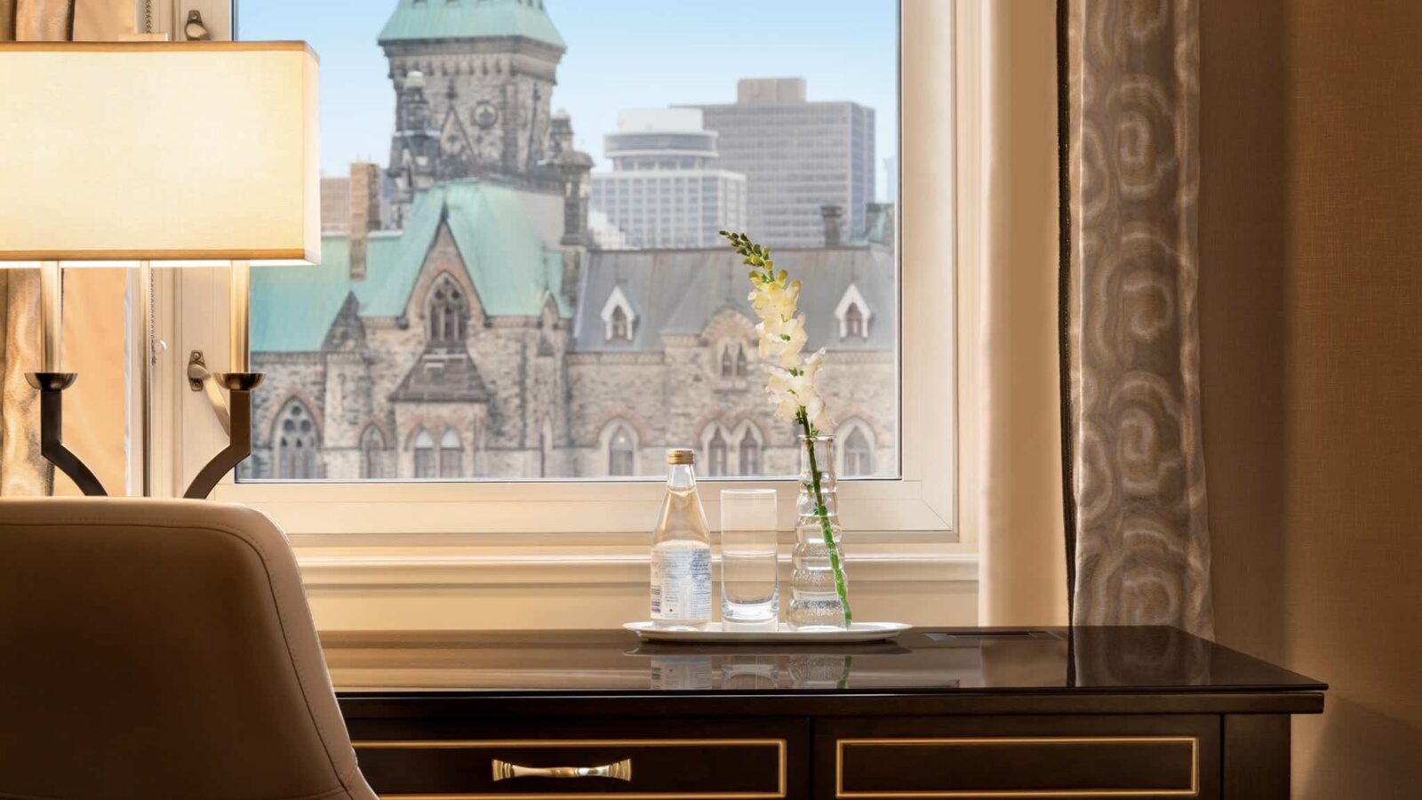 MFI - Fairmont Château Laurier luxury hotels in ontario work desk with city view from one of the best luxury hotels in Ottawa
