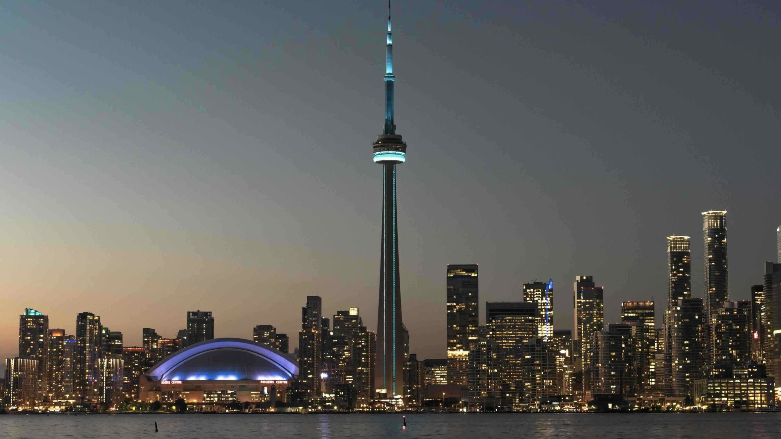 Ontario Tourist Attractions Toronto skyline at night alex-ITclj6GywRc-unsplash