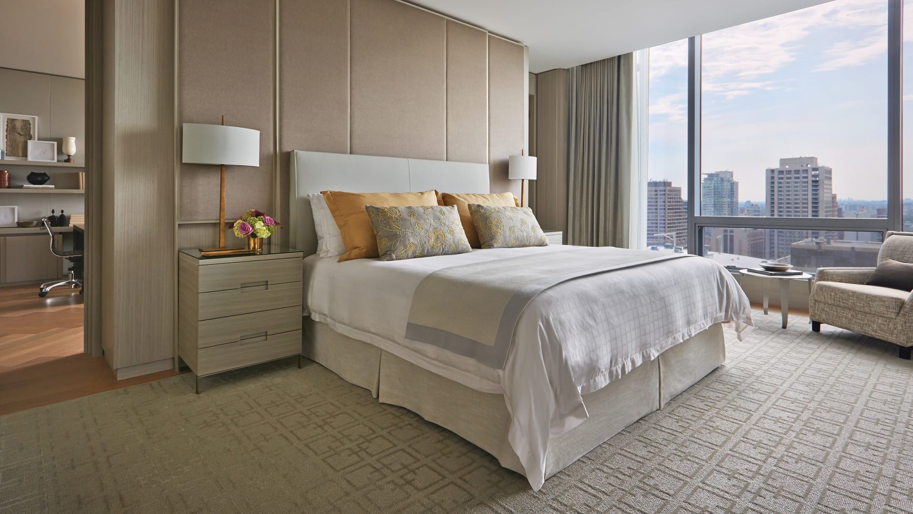 Four Seasons Hotel Toronto bedroom with city view at one of the best 5-star hotels in Toronto