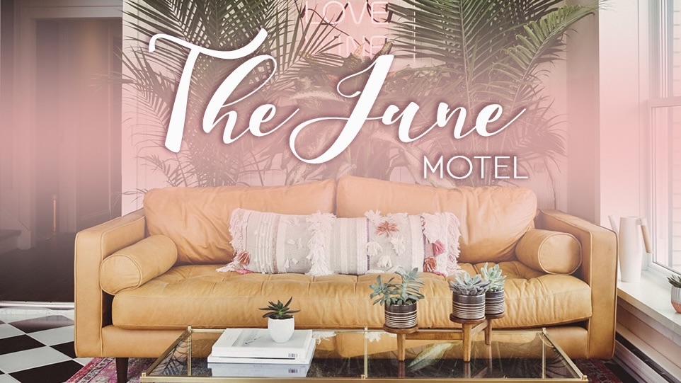The June Motel  lobby couch and sign