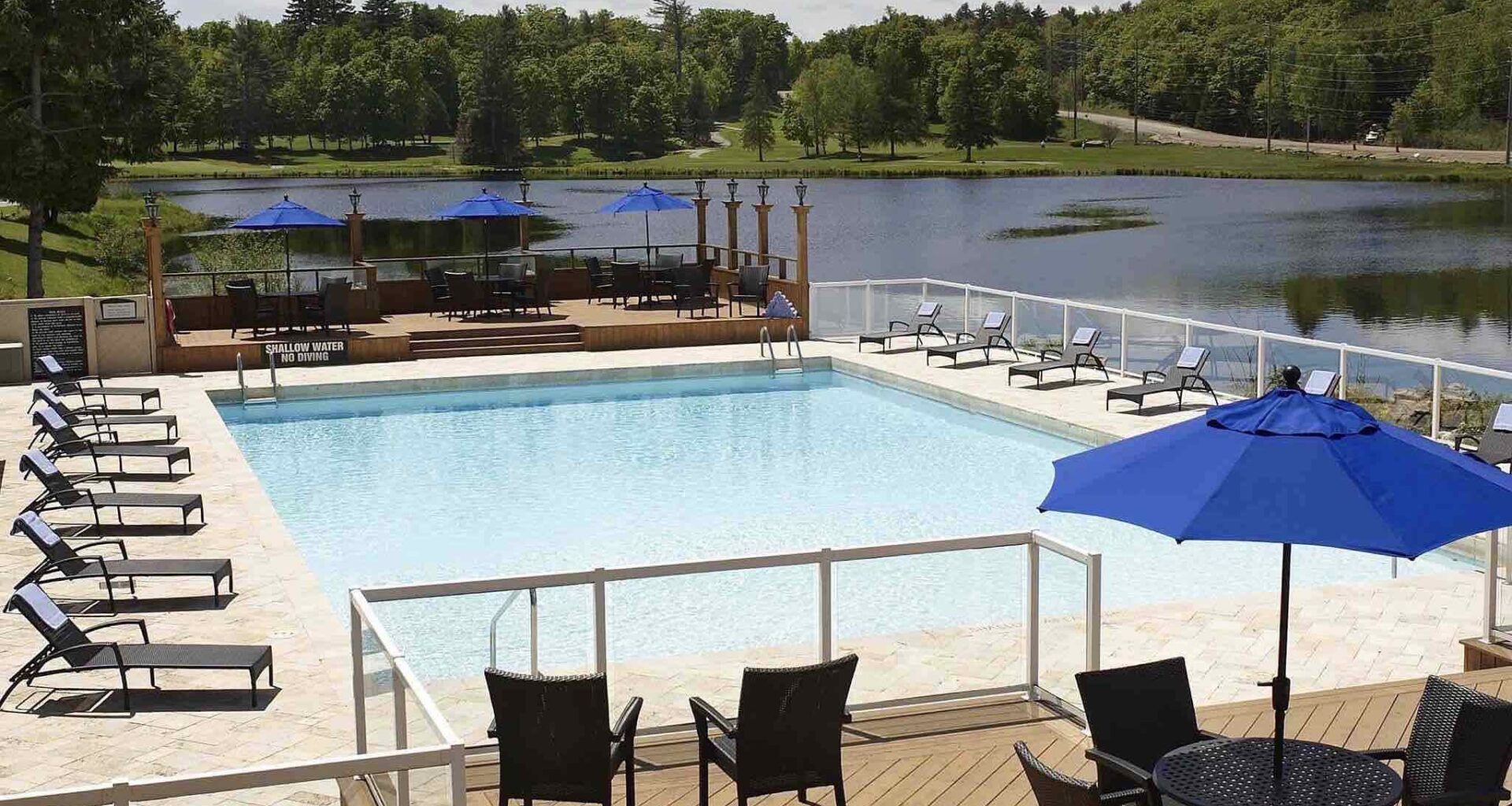 Pinestone Resort Haliburton Hotels swimming pool in summer at one of the best resorts in Haliburton