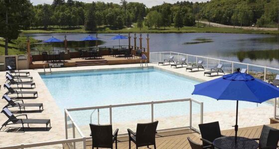 Pinestone Resort Haliburton Hotels swimming pool in summer at one of the best resorts in Haliburton