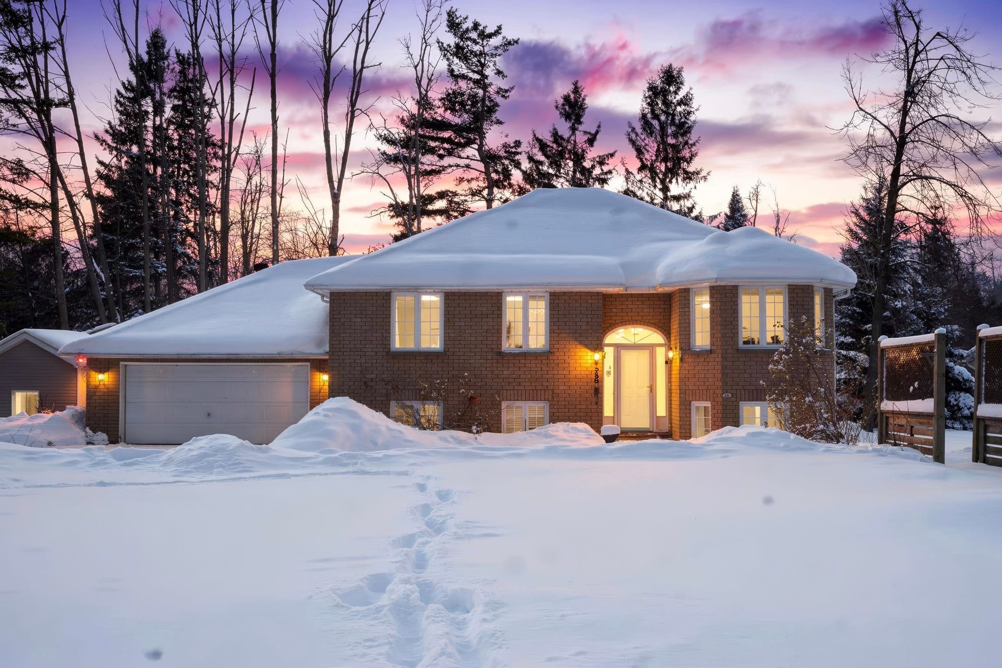 Home for Sale in Oro-Medonte at dusk in winter